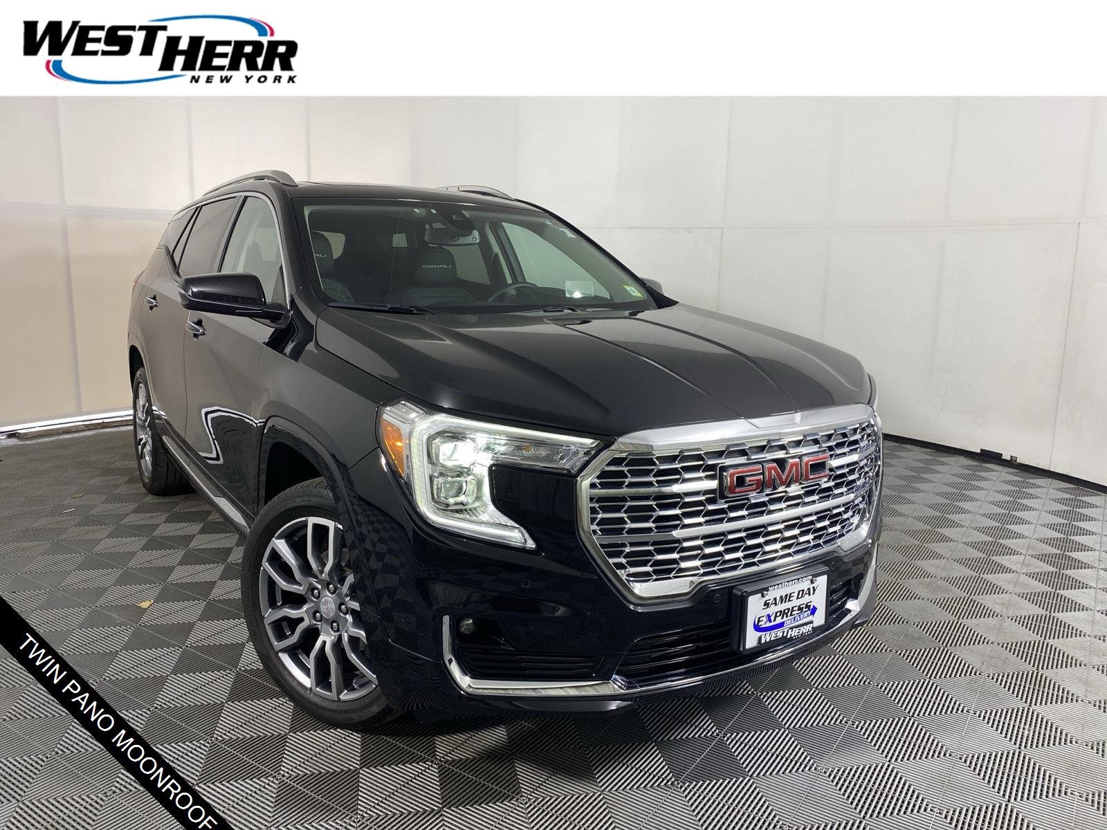 Used 2024 Ebony Twilight Metallic GMC Denali image 1