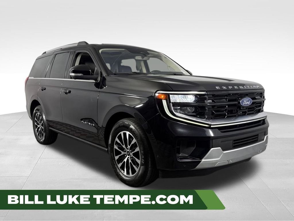 Used 2025 Black Metallic Ford Platinum image 1