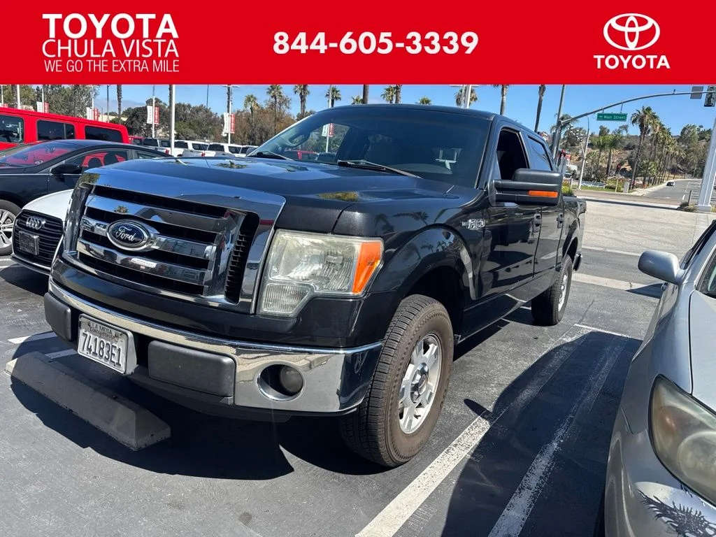 Used 2012 Black Ford XLT image 1