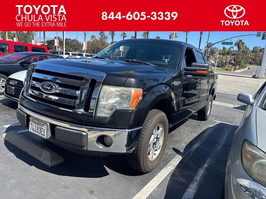 Used 2012 Black Ford XLT image 1