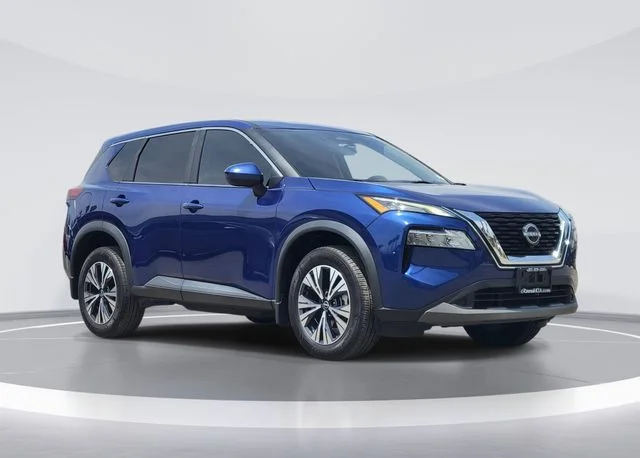 Used 2023 Caspian Blue Metallic Nissan SV image 1
