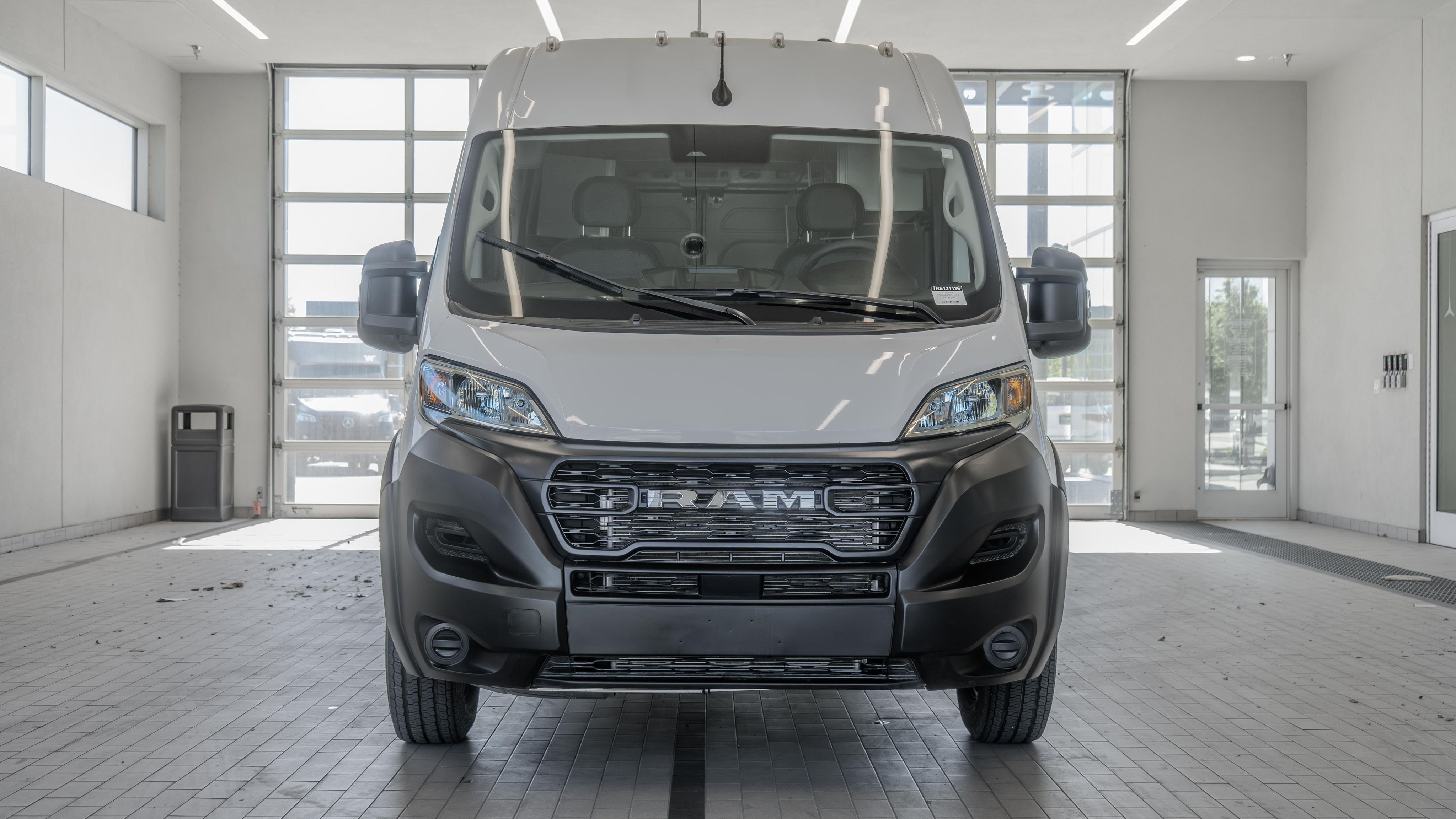 Used 2024 Bright White Clearcoat Ram High Roof image 11