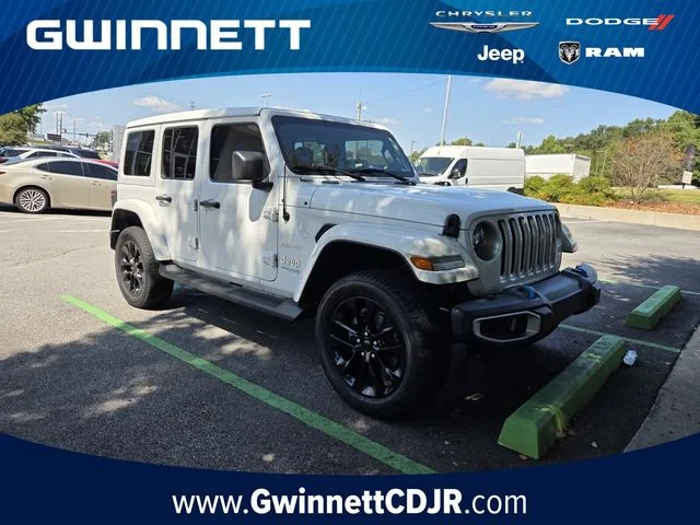 Used 2022 White Jeep Unlimited Sahara 4xe image 1
