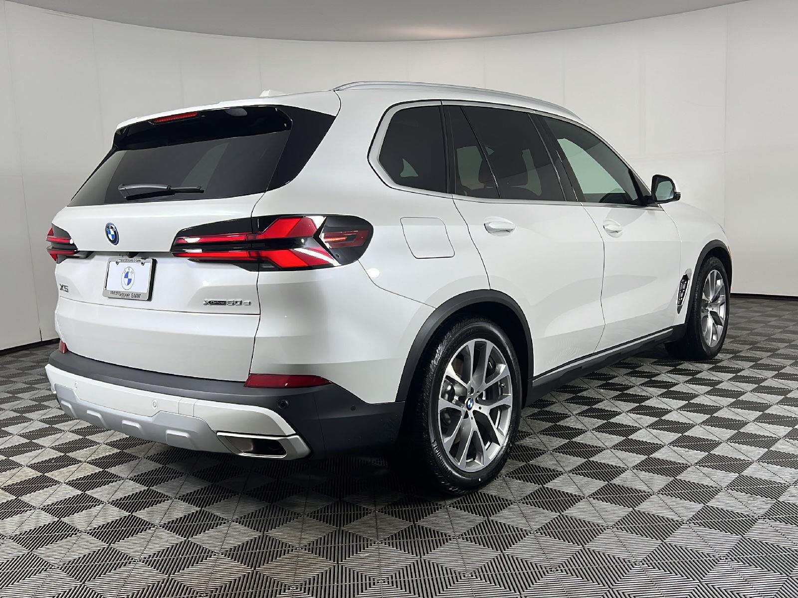 New 2026 Mineral White Metallic BMW xDrive50e image 3
