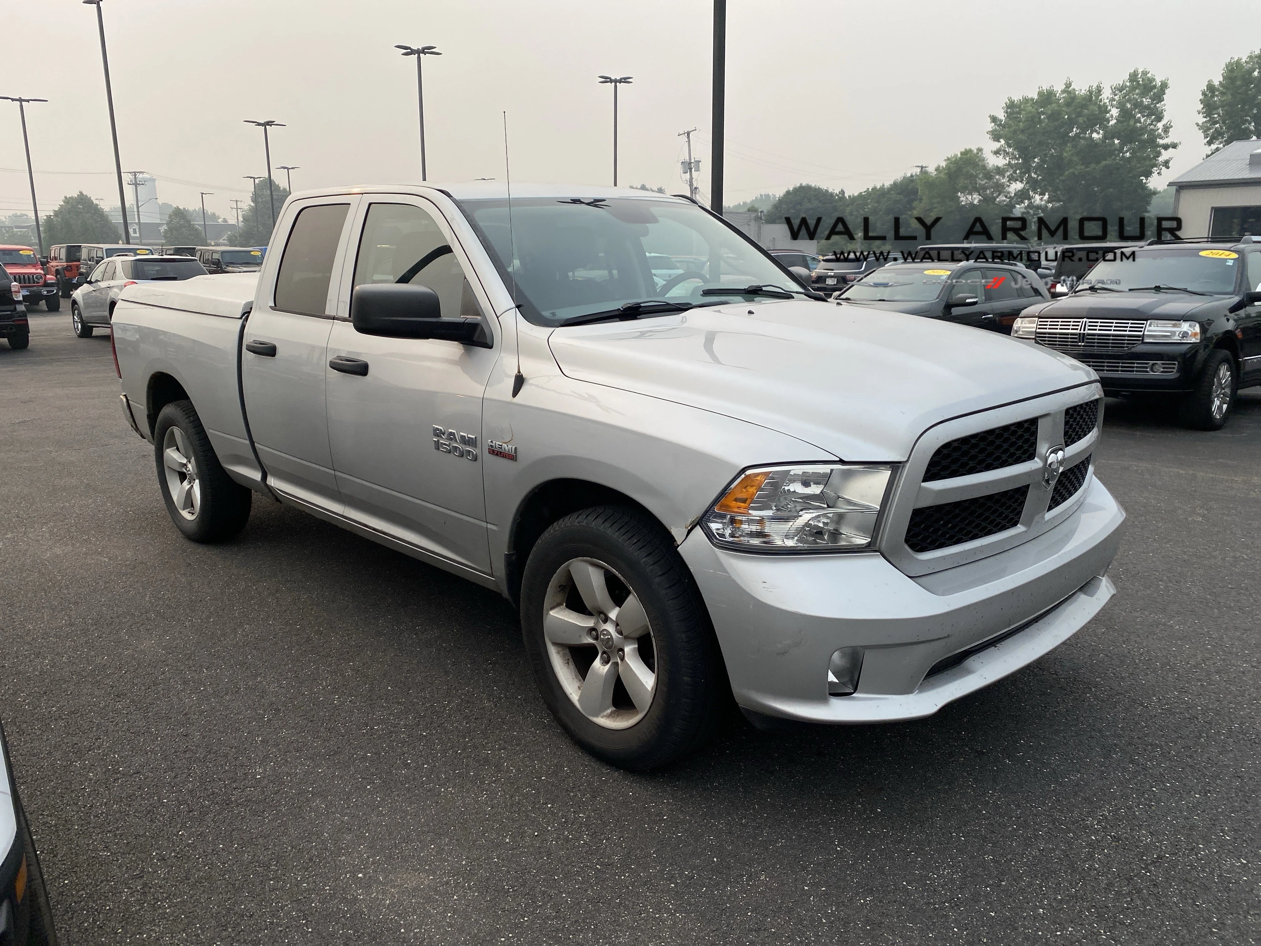 Used 2014 Bright Silver Metallic Clearcoat Ram  image 1