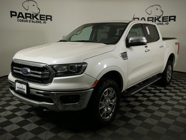 Used 2019 White Platinum Tri-Coat Ford Crew Cab LARIAT w/ FX4 Off-Road Pkg & Technology Pkg image 1