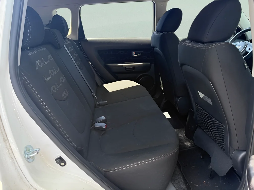 Used 2012 Clear White Kia Plus image 9