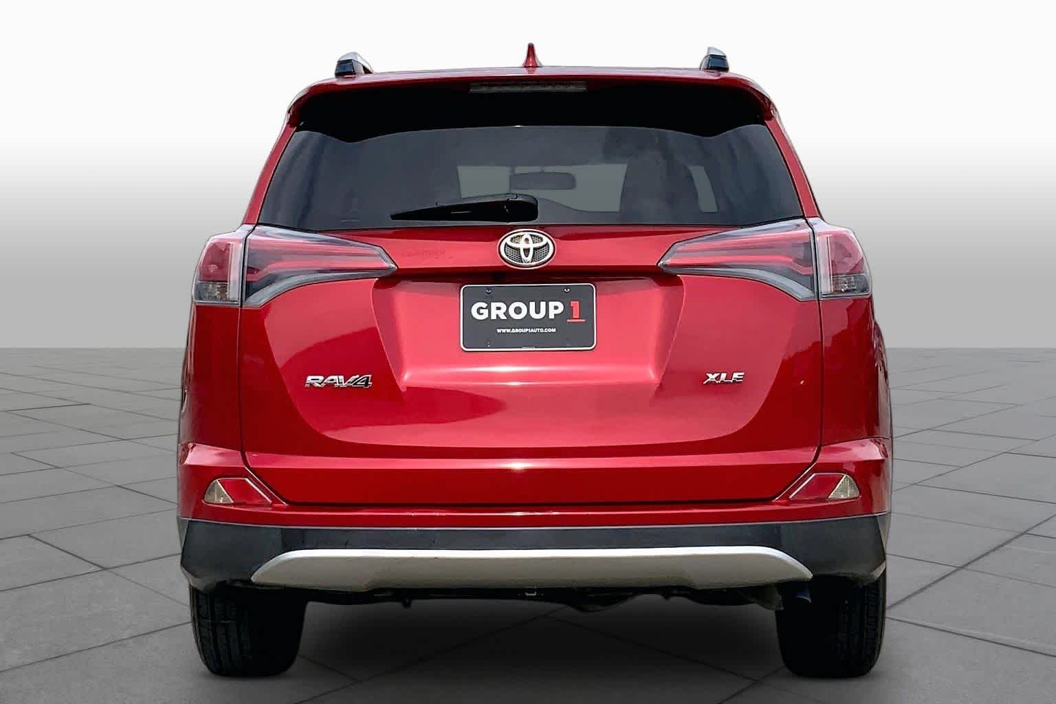 Used 2016 Barcelona Red Metallic Toyota XLE image 5