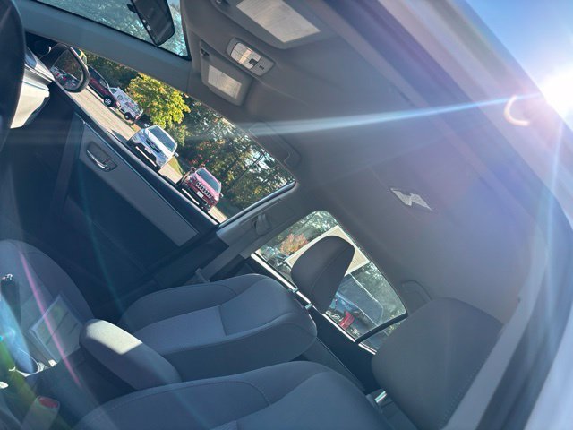 Used 2015 Super White Toyota LE image 16
