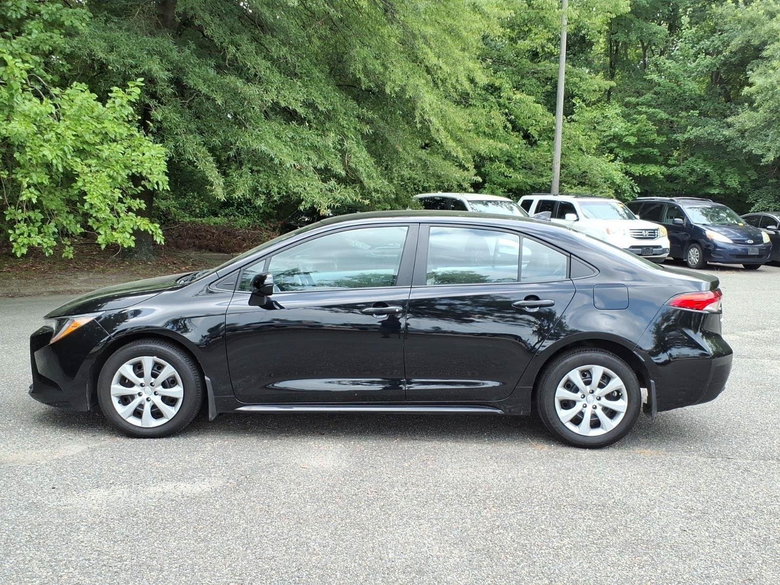 Used 2025 Midnight Black Metallic Toyota LE image 3
