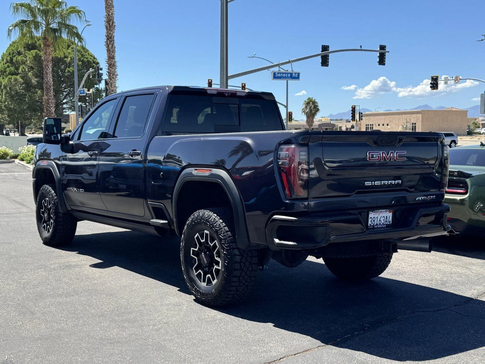 Used 2024 Titanium Rush Metallic GMC AT4X image 4