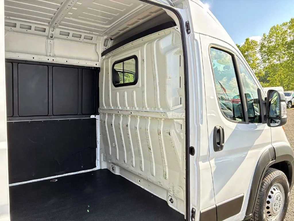 Used 2025 Bright White Clearcoat Ram High Roof image 12