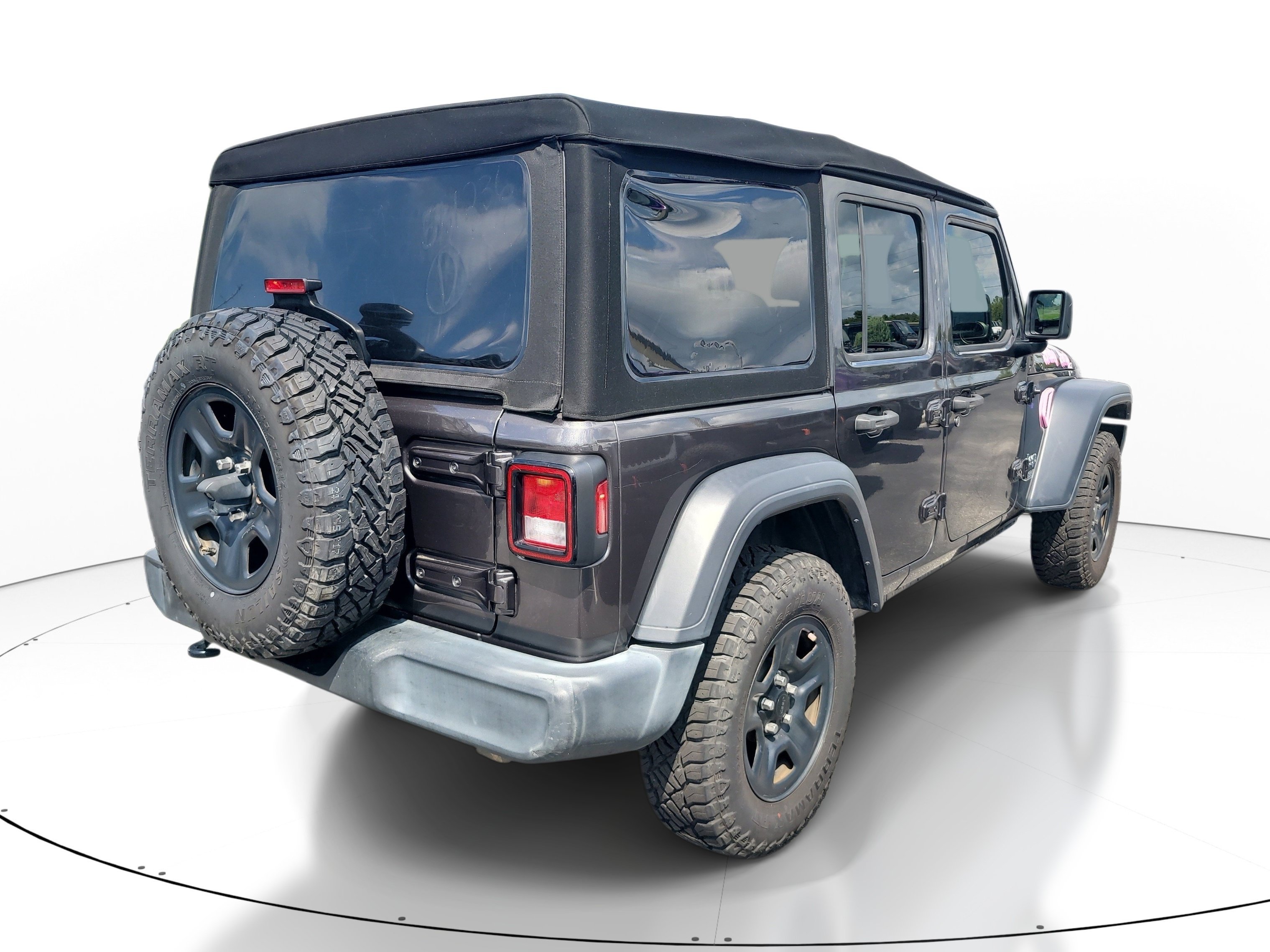 Used 2019 Granite Crystal Metallic Clearcoat Jeep Sport image 4