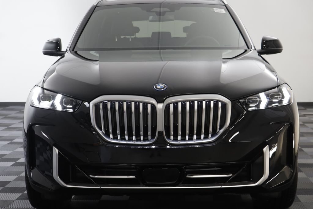 New 2026 Black Sapphire Metallic BMW xDrive50e image 23