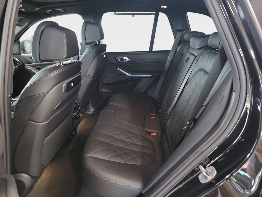 New 2026 Black Sapphire Metallic BMW xDrive50e image 9