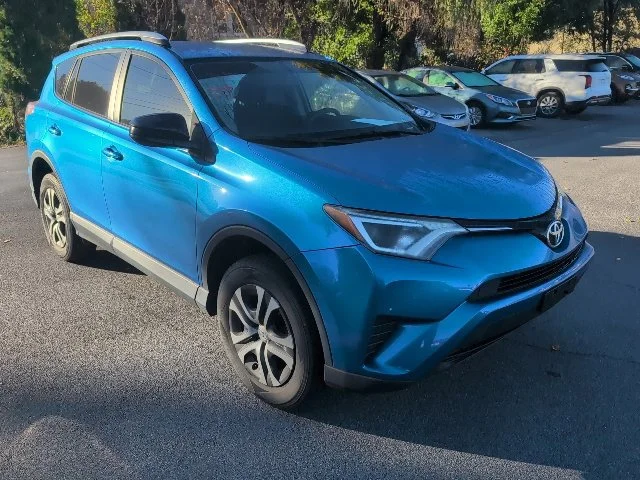 Used 2016 Blue Toyota LE image 1