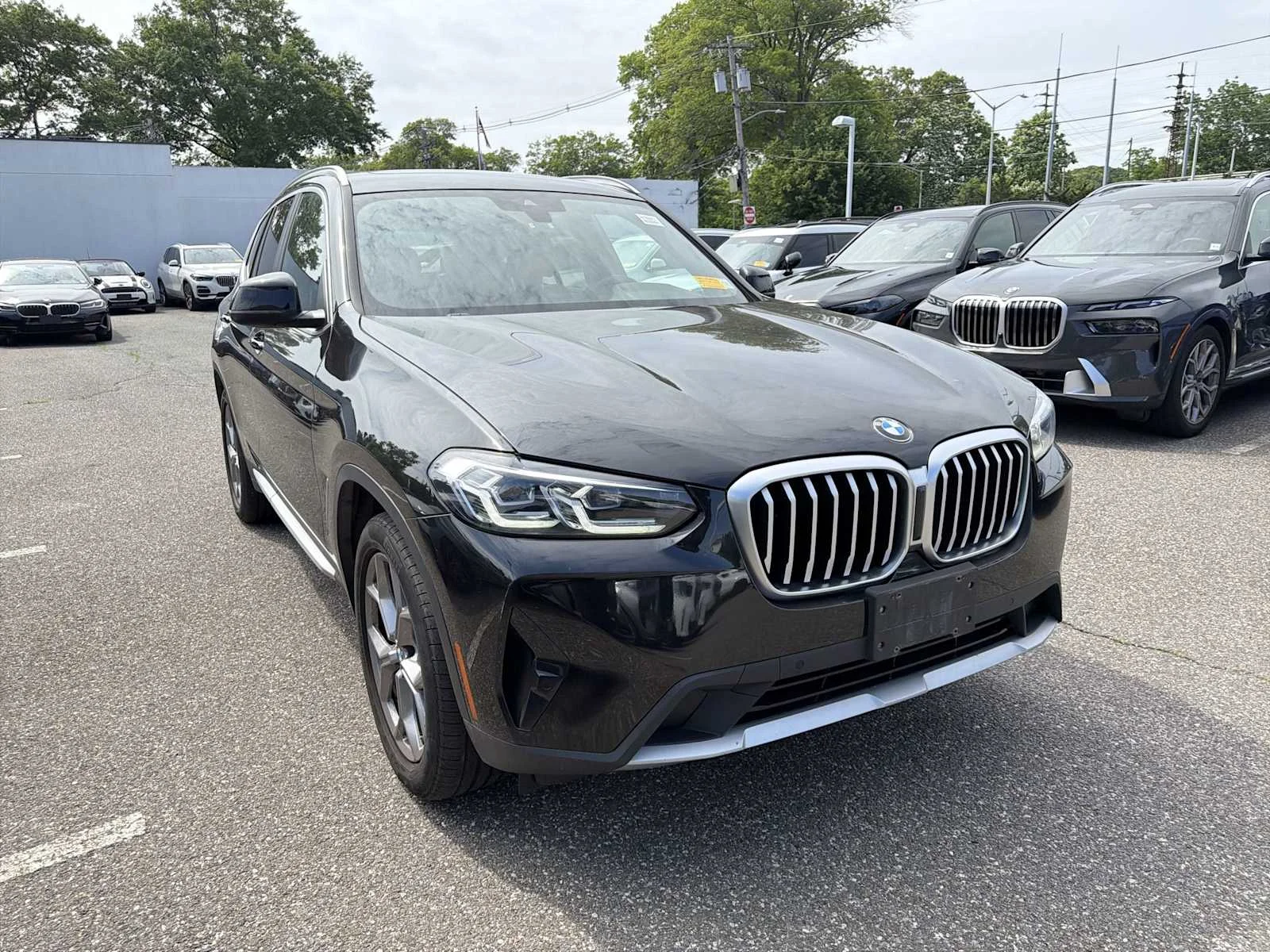Used 2024 Black Sapphire Metallic BMW xDrive30i image 2