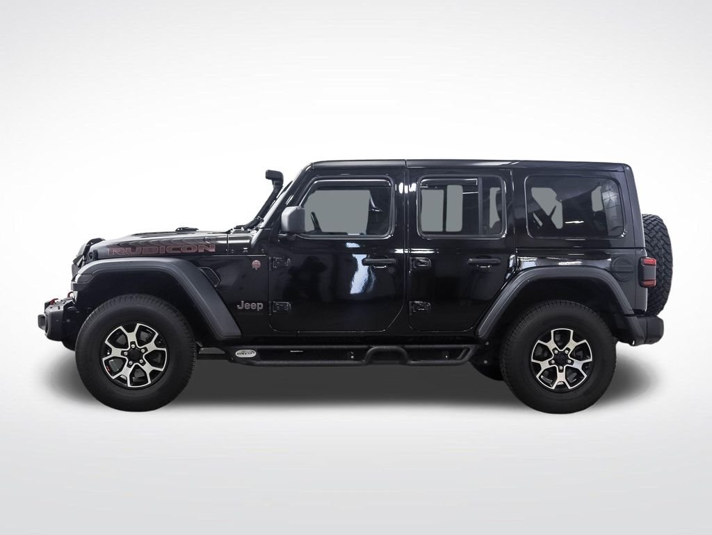 Used 2021 Jeep Wrangler Unlimited Rubicon with VIN 1C4HJXFN2MW557619 for sale in Minneapolis, Minnesota