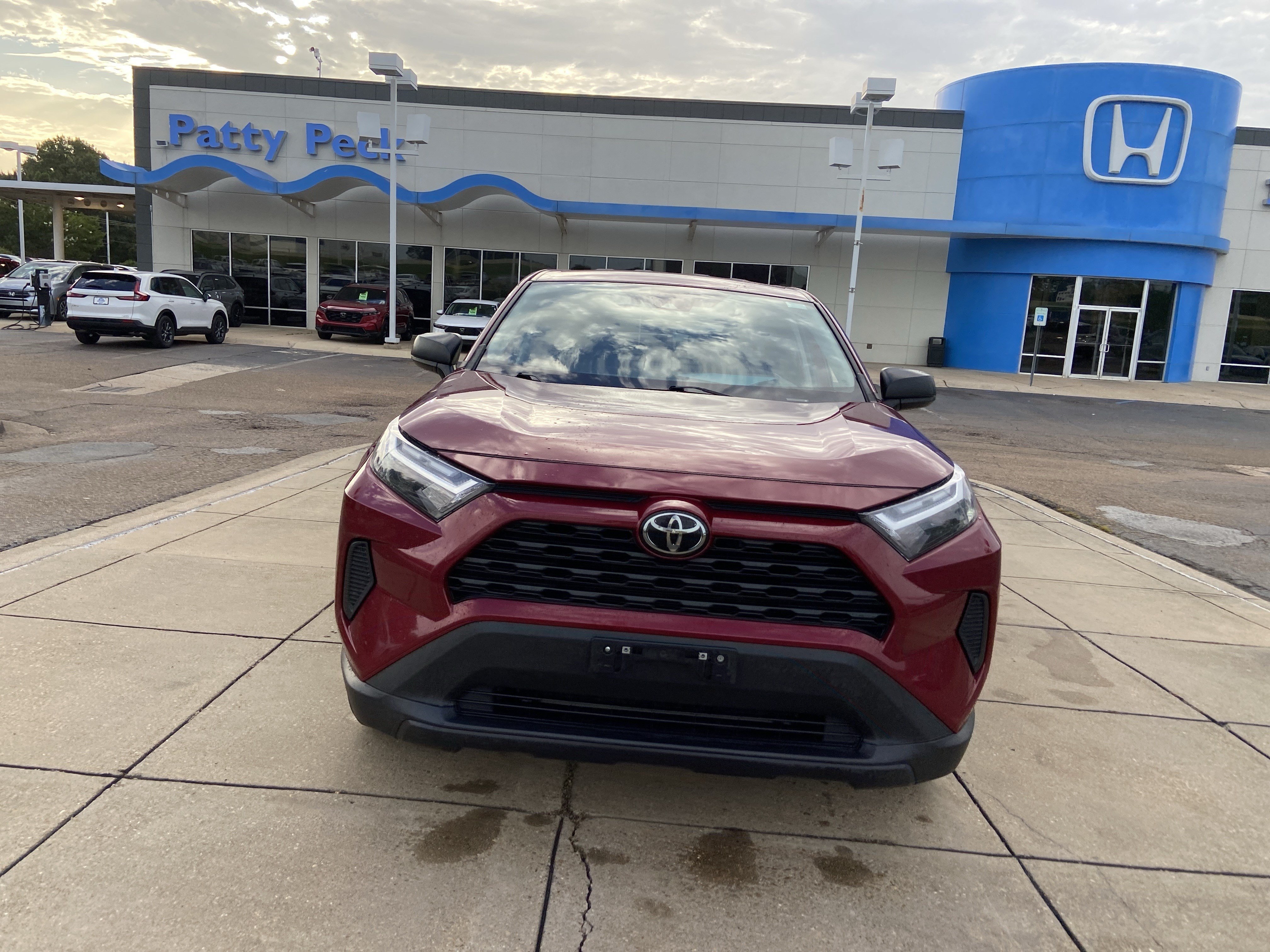 Used 2023 Ruby Flare Pearl Toyota LE image 3