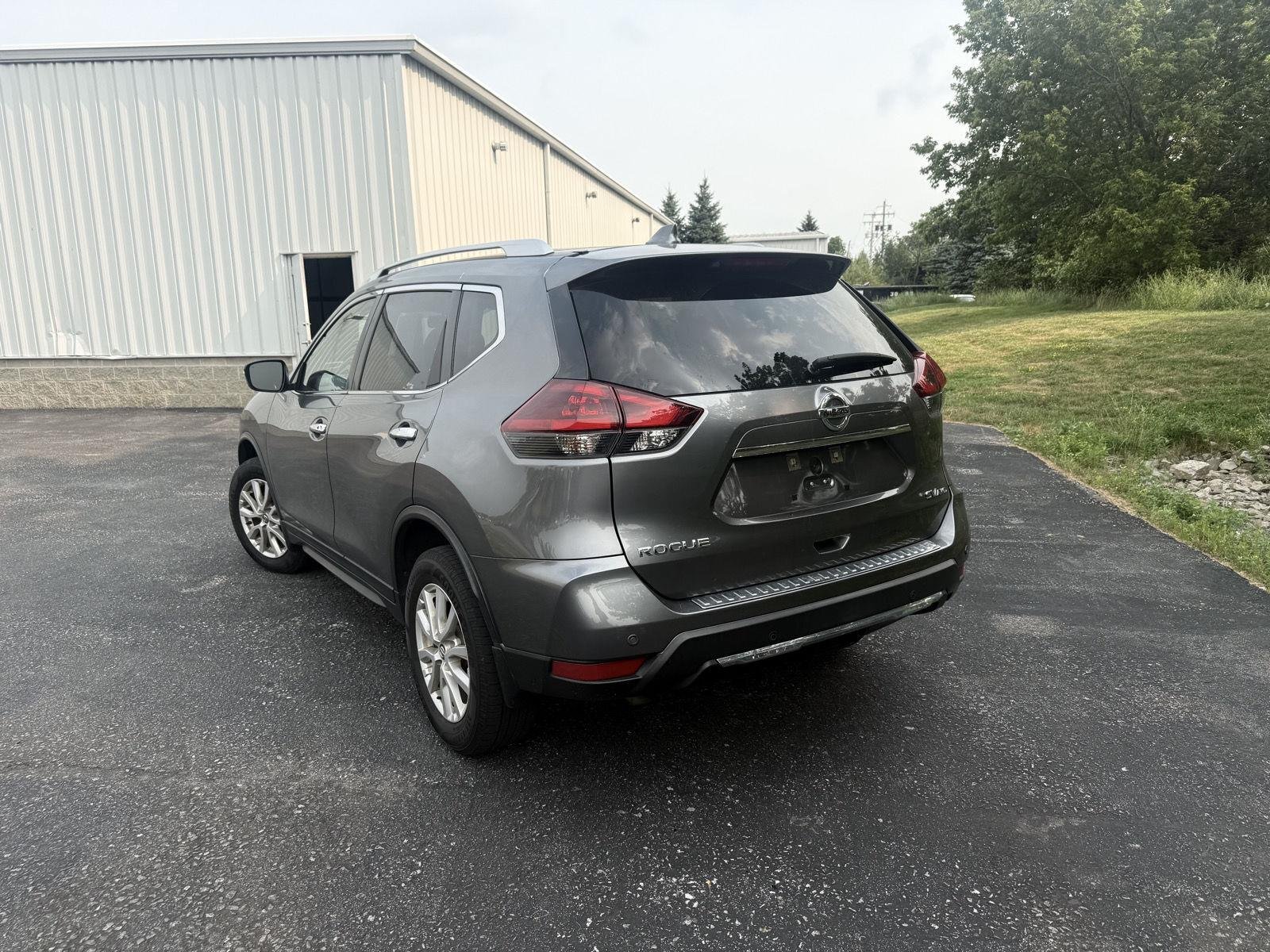 Used 2019 Gun Metallic Nissan SV image 2