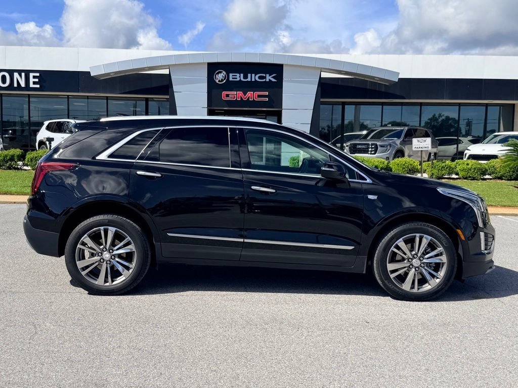Used 2021 STELLAR BLACK METALLIC Cadillac FWD Premium Luxury image 4