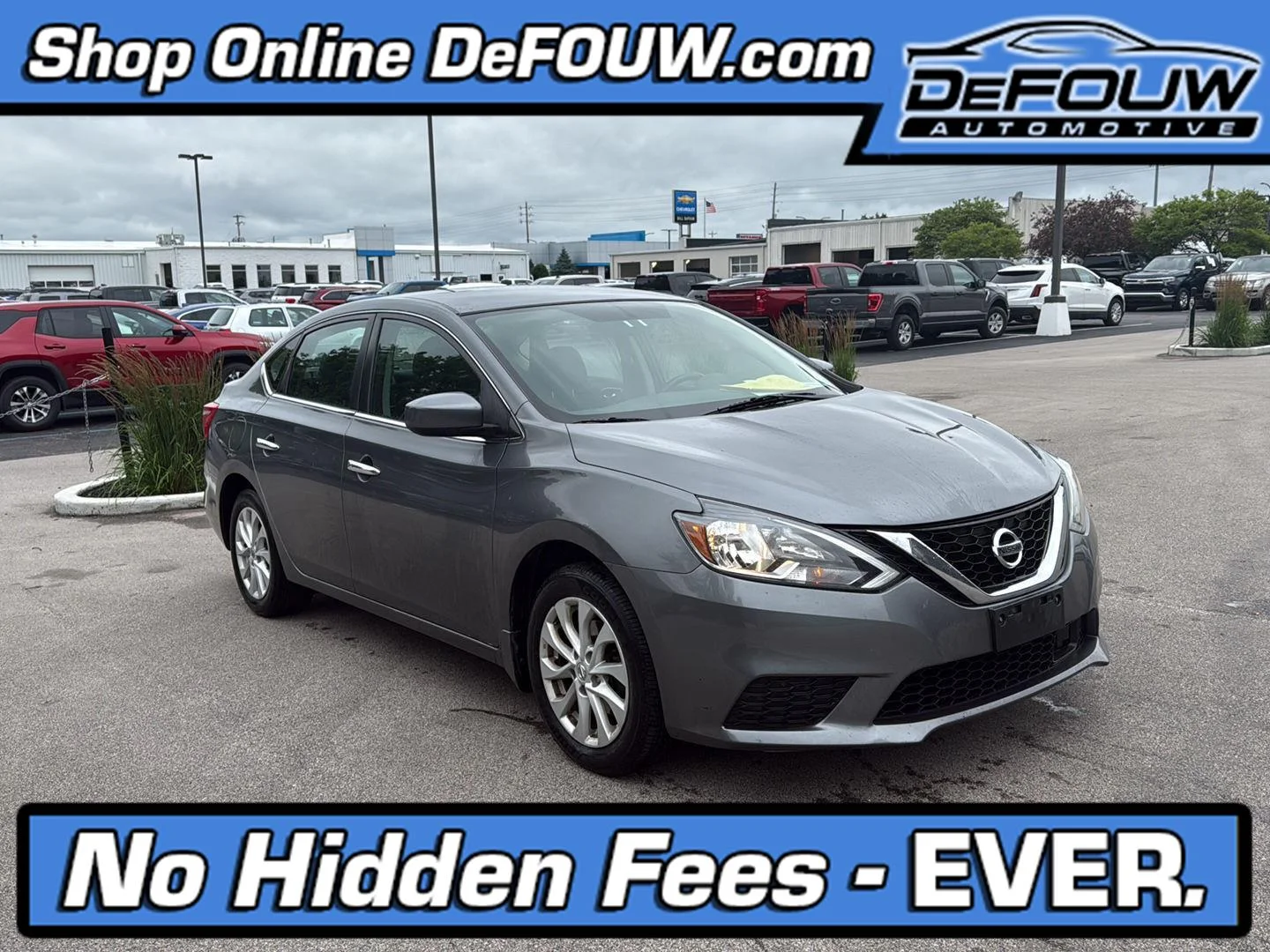 Used 2019 Gun Metallic Nissan SV image 1