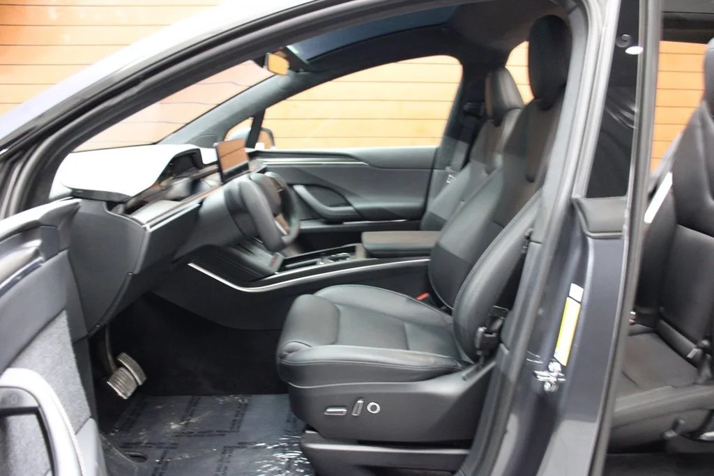 Used 2022 Solid Black Tesla Plaid image 12