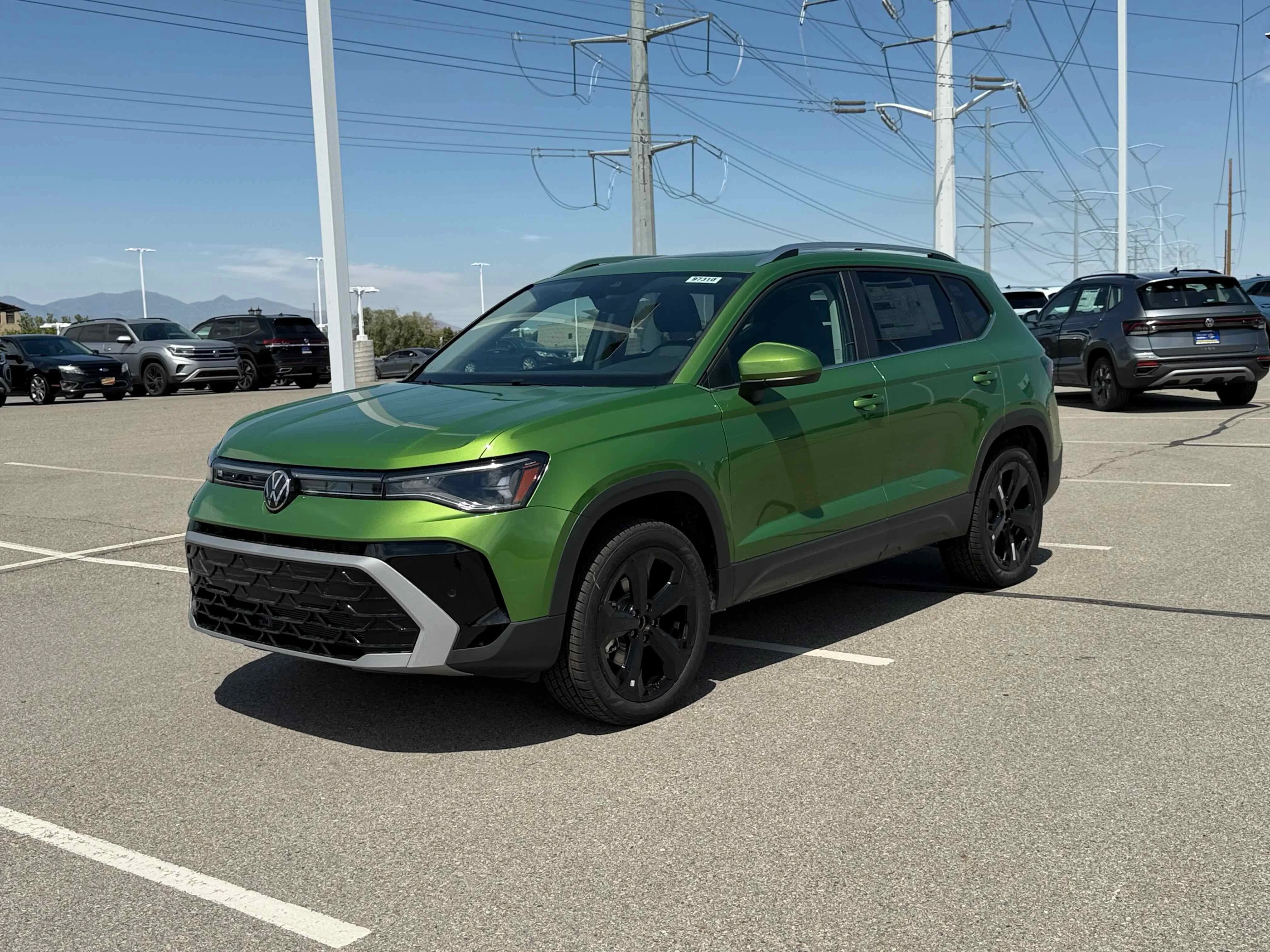 New 2026 Moss Green Volkswagen SEL image 1