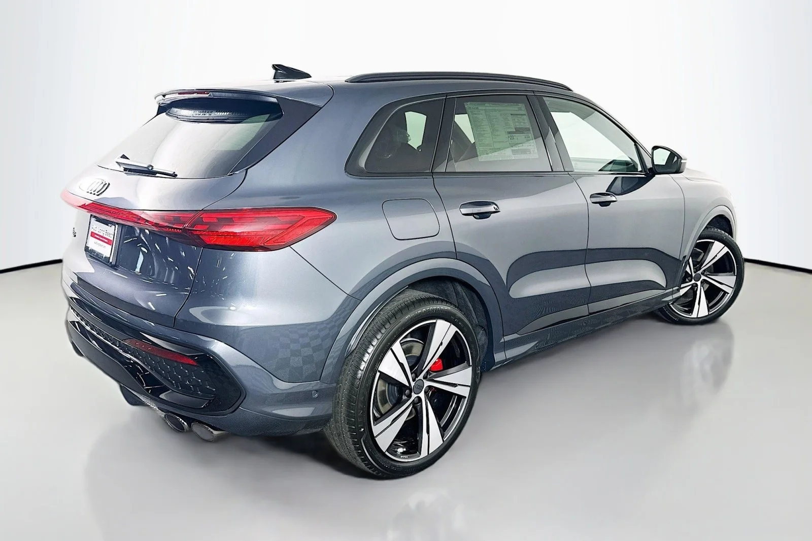 New 2026 Tambora Gray Metallic Audi Premium Plus image 13