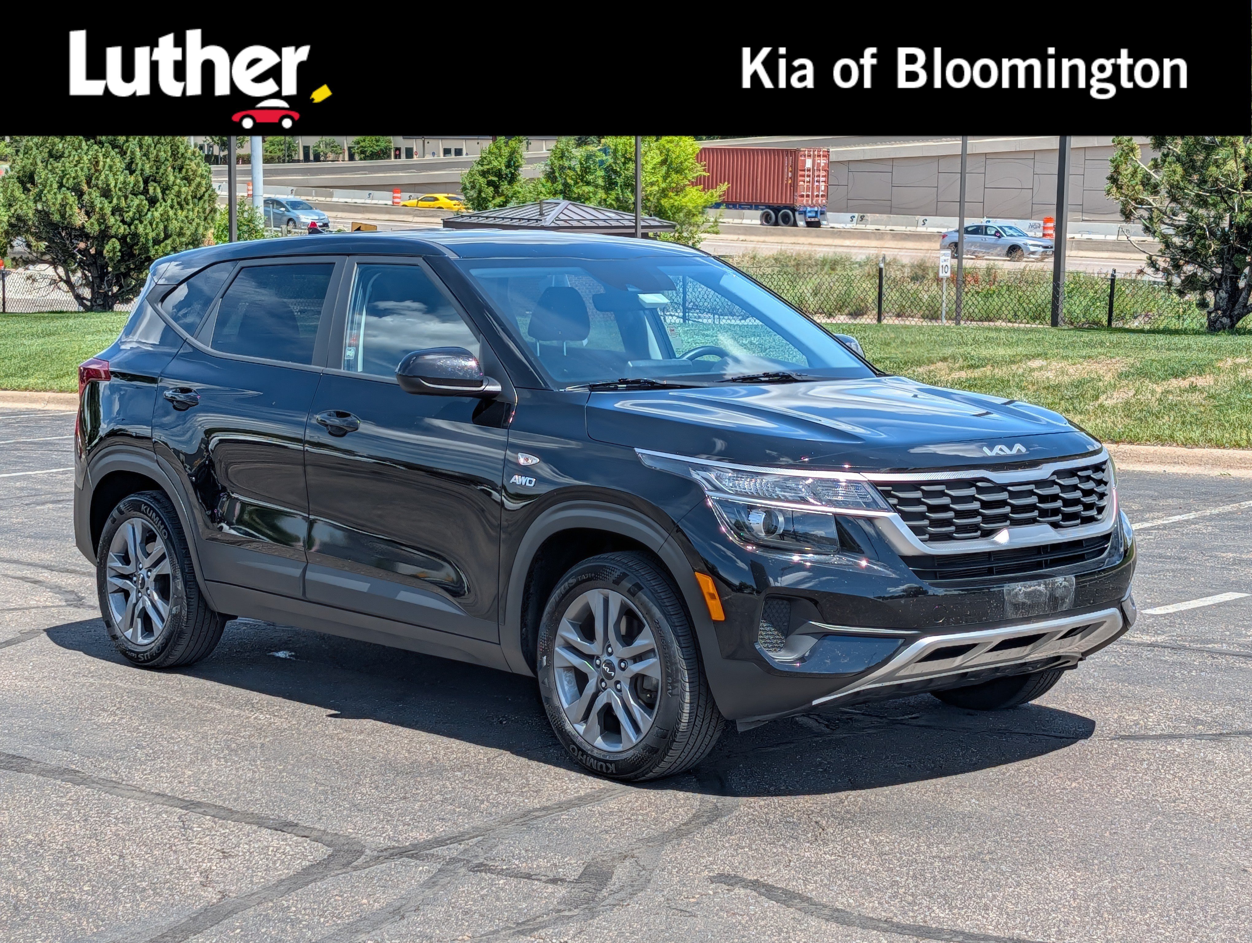 Certified Used 2022 Cherry Black Kia LX image 1