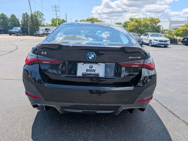 Certified Used 2023 Black Sapphire Metallic BMW eDrive40 image 4