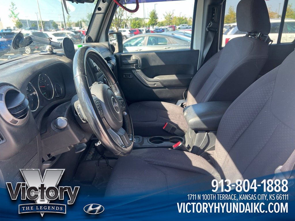 Used 2013 White Jeep Unlimited Sport image 9