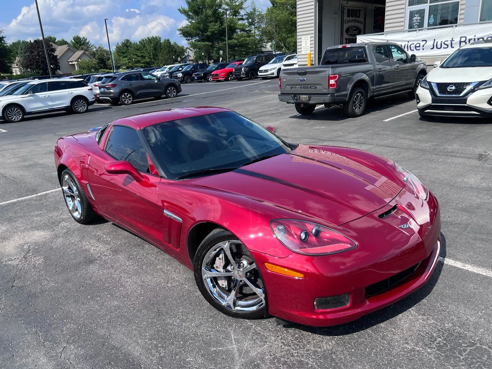 Used 2012 Crystal Red Tintcoat Chevrolet Grand Sport image 16