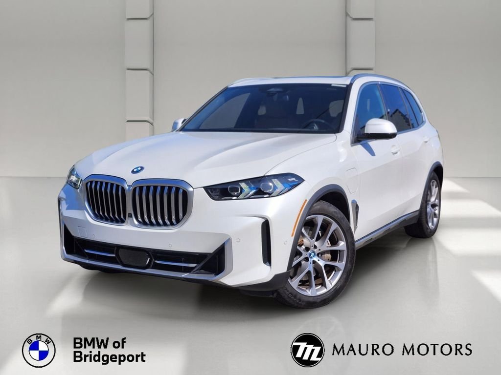 Used 2024 White BMW xDrive50e image 1