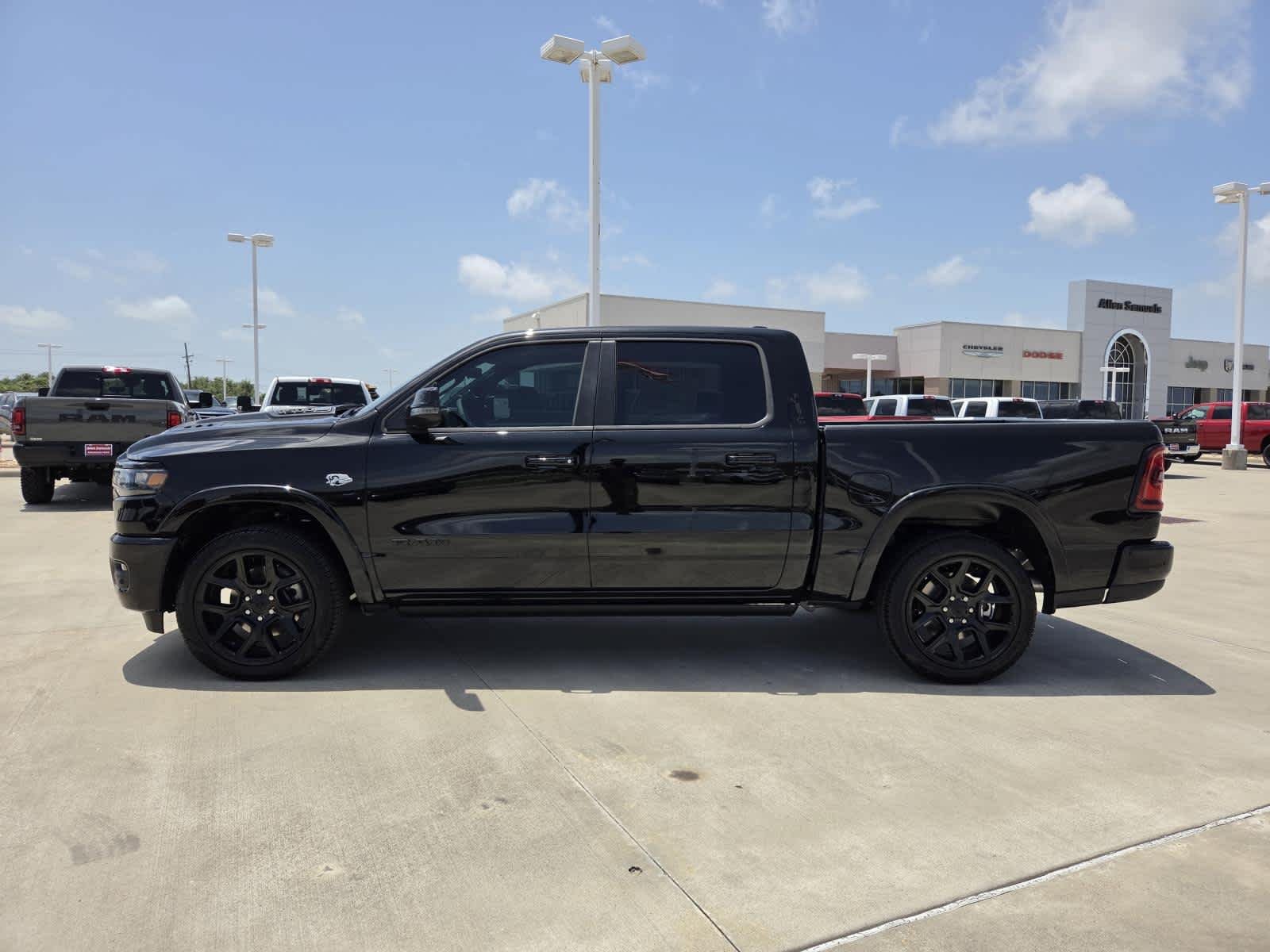 New 2026 Diamond Black Crystal Pearl-Coat Exterior Paint RAM Laramie image 2