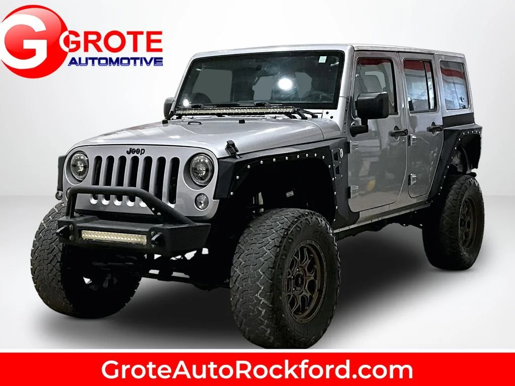 Used 2015 Silver Jeep Unlimited Sport image 1