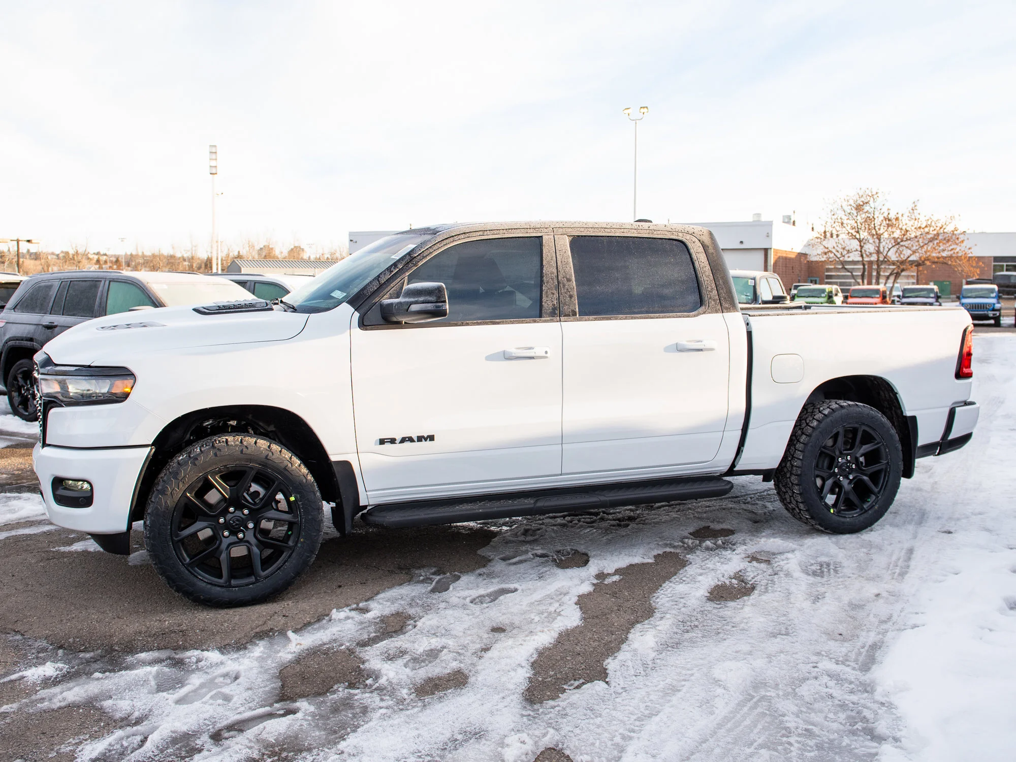 New 2026 White RAM Sport*, 2 Inch Lift, 33 Inch Tires image 5
