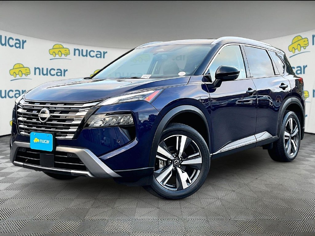 Used 2024 Deep Ocean Blue Pearl/Super Black Nissan SL image 3