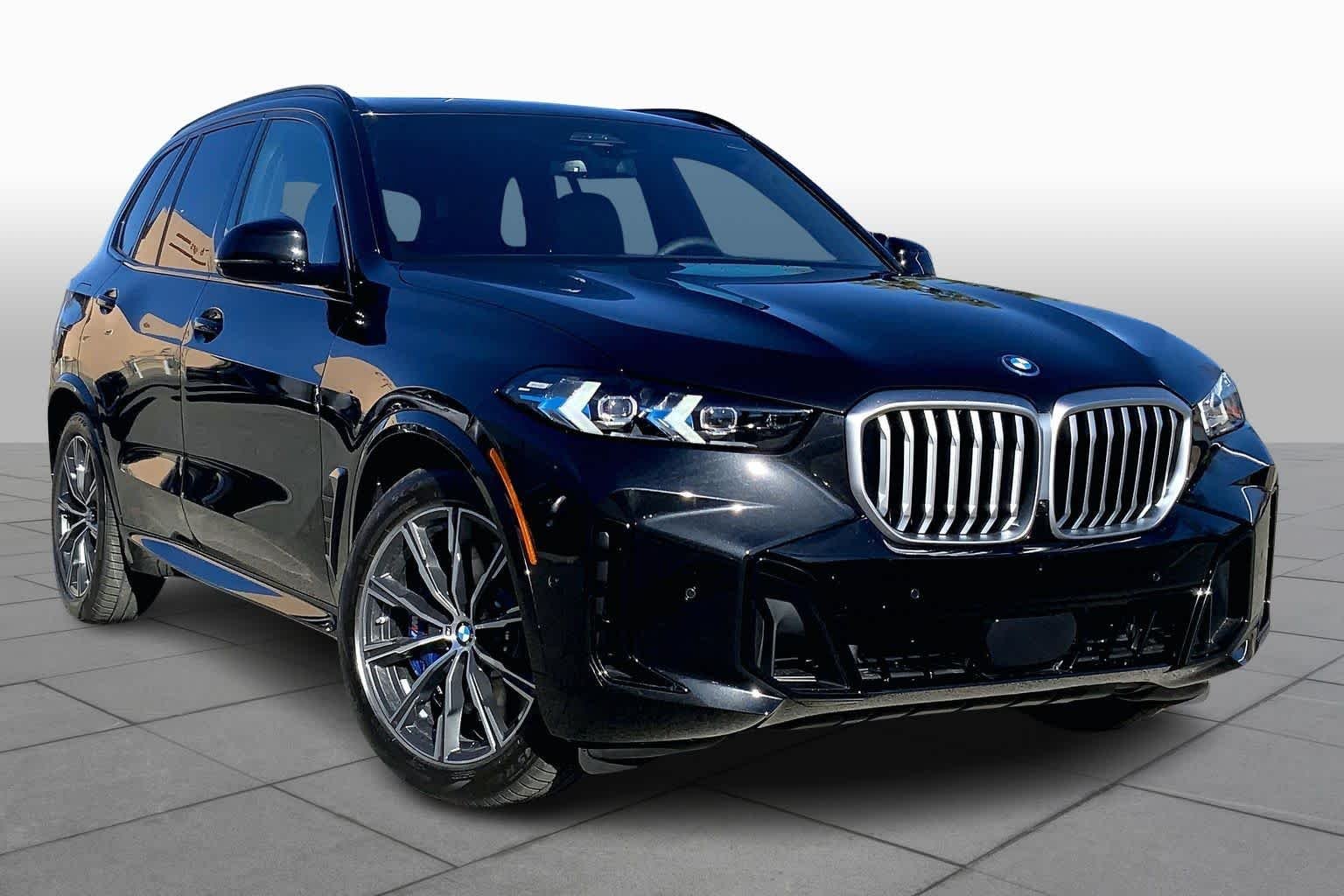 New 2026 Black Sapphire Metallic BMW xDrive50e image 2