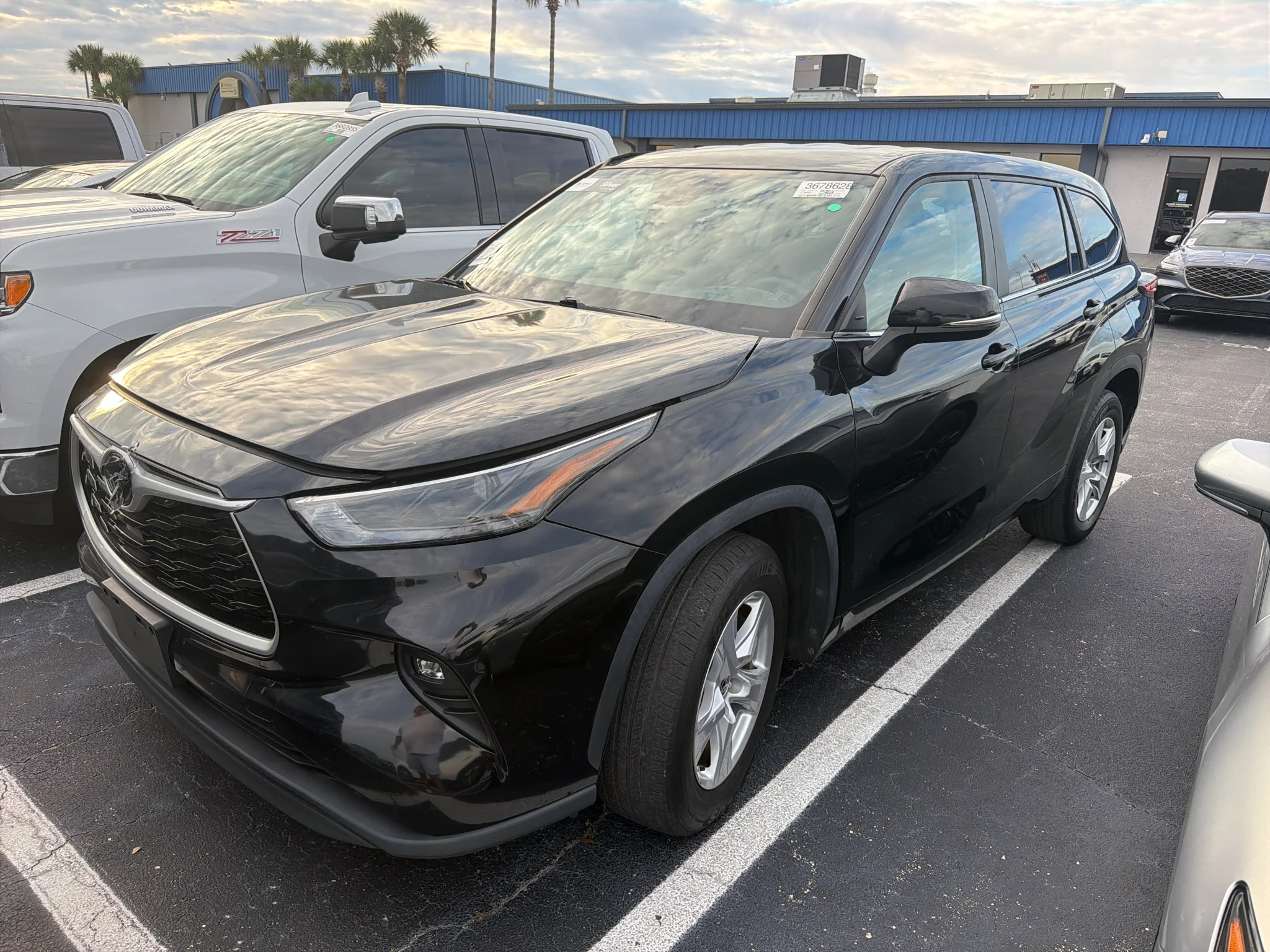 Used 2023 Midnight Black Metallic Toyota LE image 2