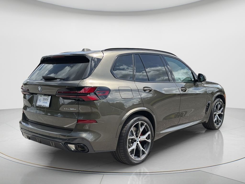 Certified Used 2026 Manhattan Green Metallic BMW xDrive50e image 3