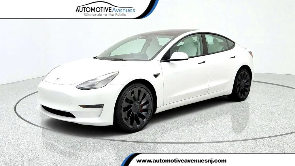 Used 2023 Pearl White Multi-Coat Tesla Performance AWD w/ White & Black Premium Interior image 1