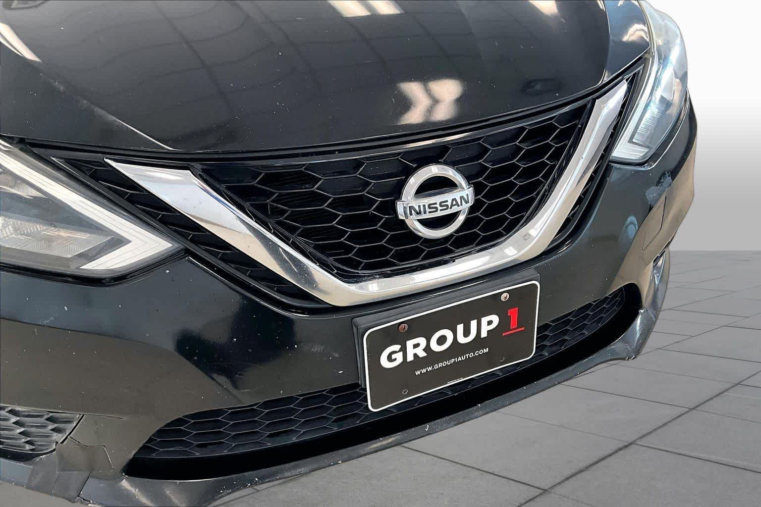 Used 2017 Super Black Nissan SV image 28