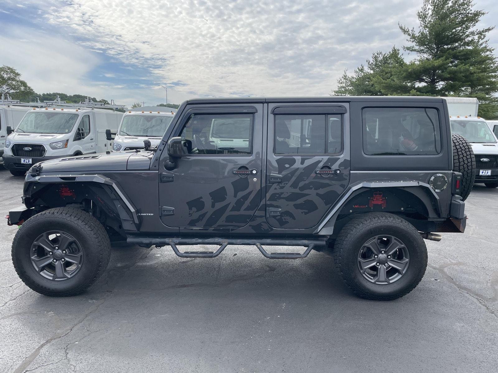 Used 2017 Jeep Wrangler Unlimited Sport with VIN 1C4BJWDG9HL602227 for sale in East Peoria, IL