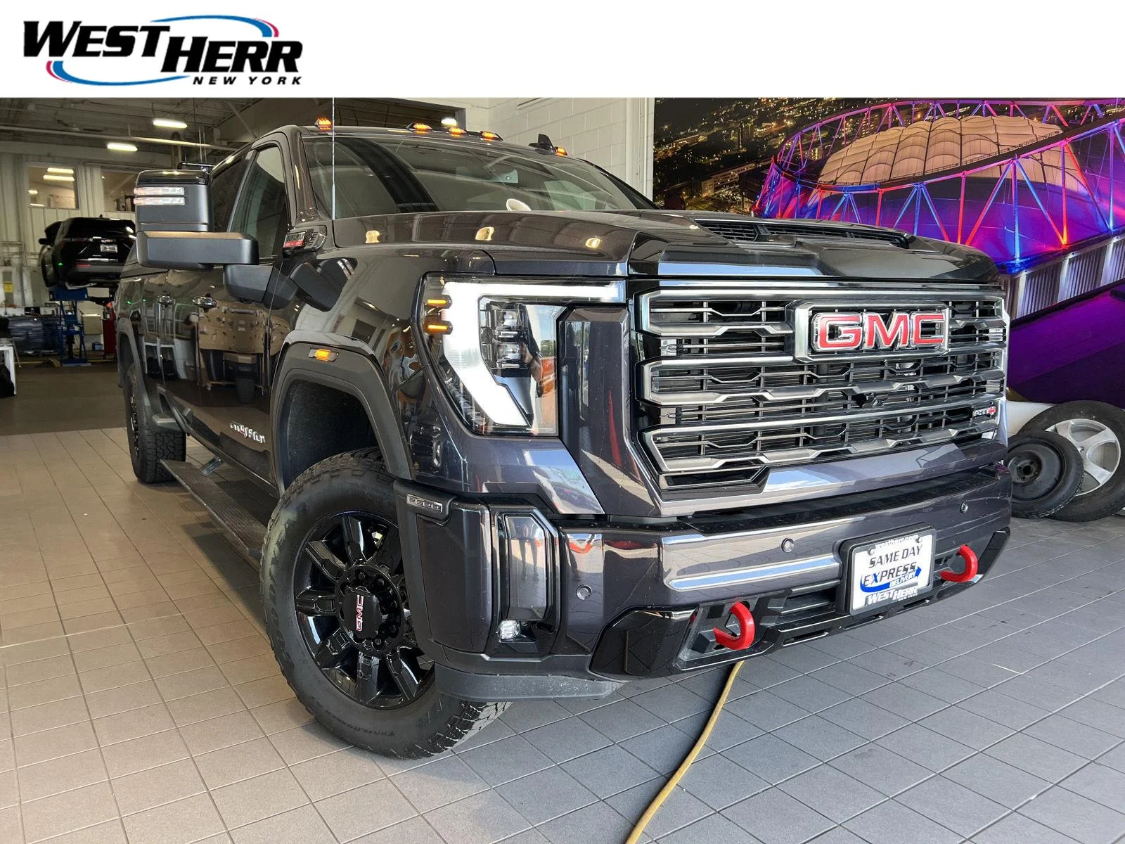 Used 2024 Titanium Rush Metallic GMC AT4 image 1
