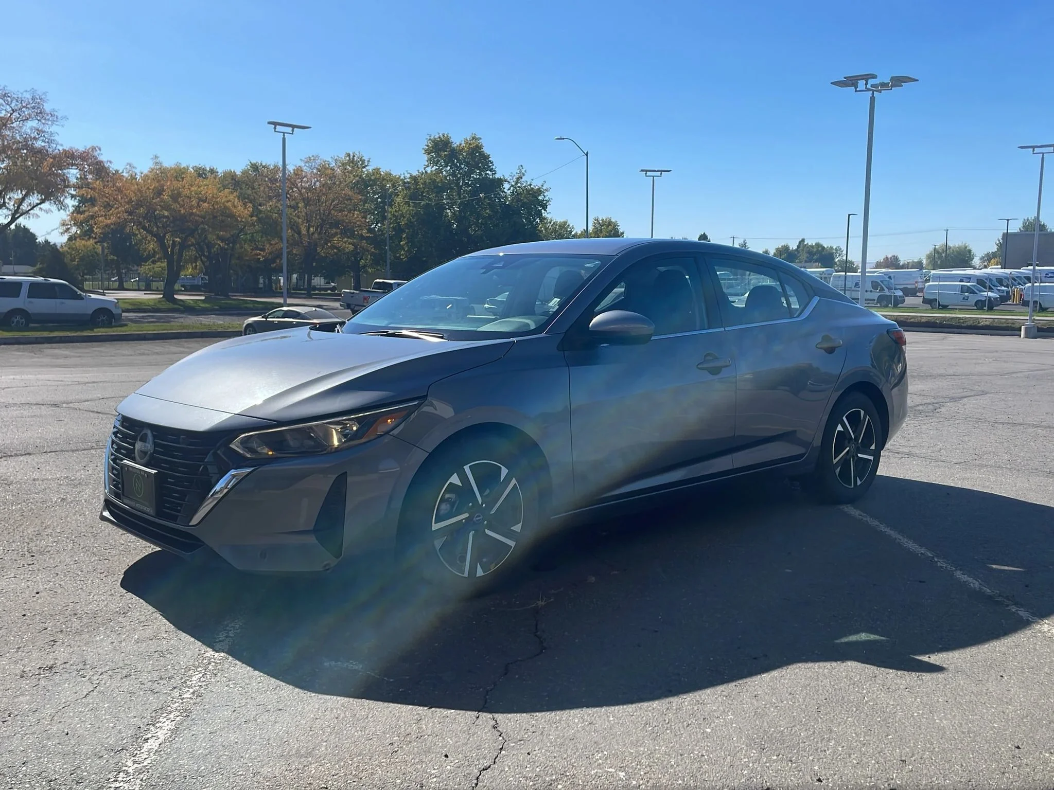 Used 2024 Gun Metallic Nissan SV image 3