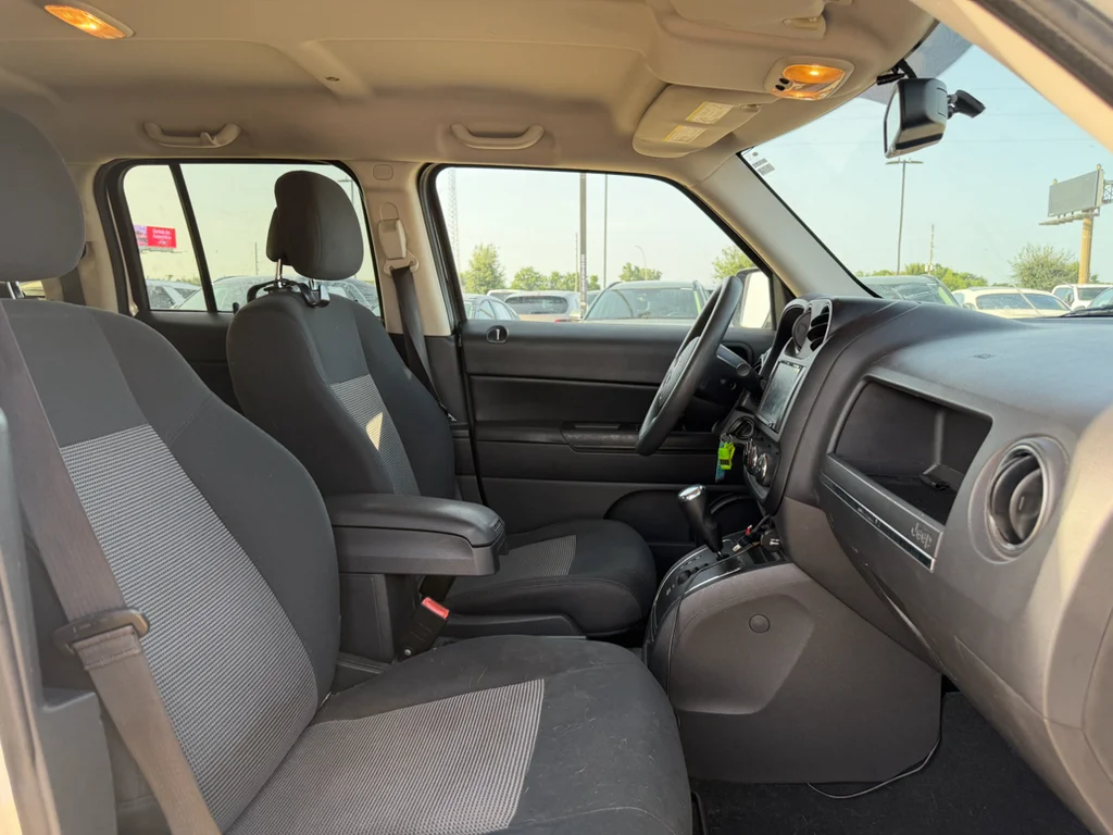 Used 2011 Bright Silver Metallic Clearcoat Jeep Sport image 11