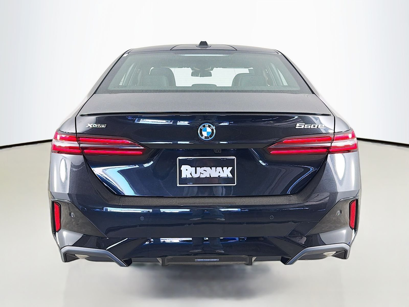 New 2027 Black Sapphire Metallic BMW 550e xDrive image 6