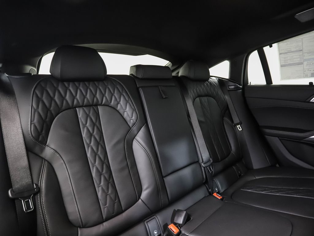 Used 2026 Black Sapphire Metallic BMW M60i image 28