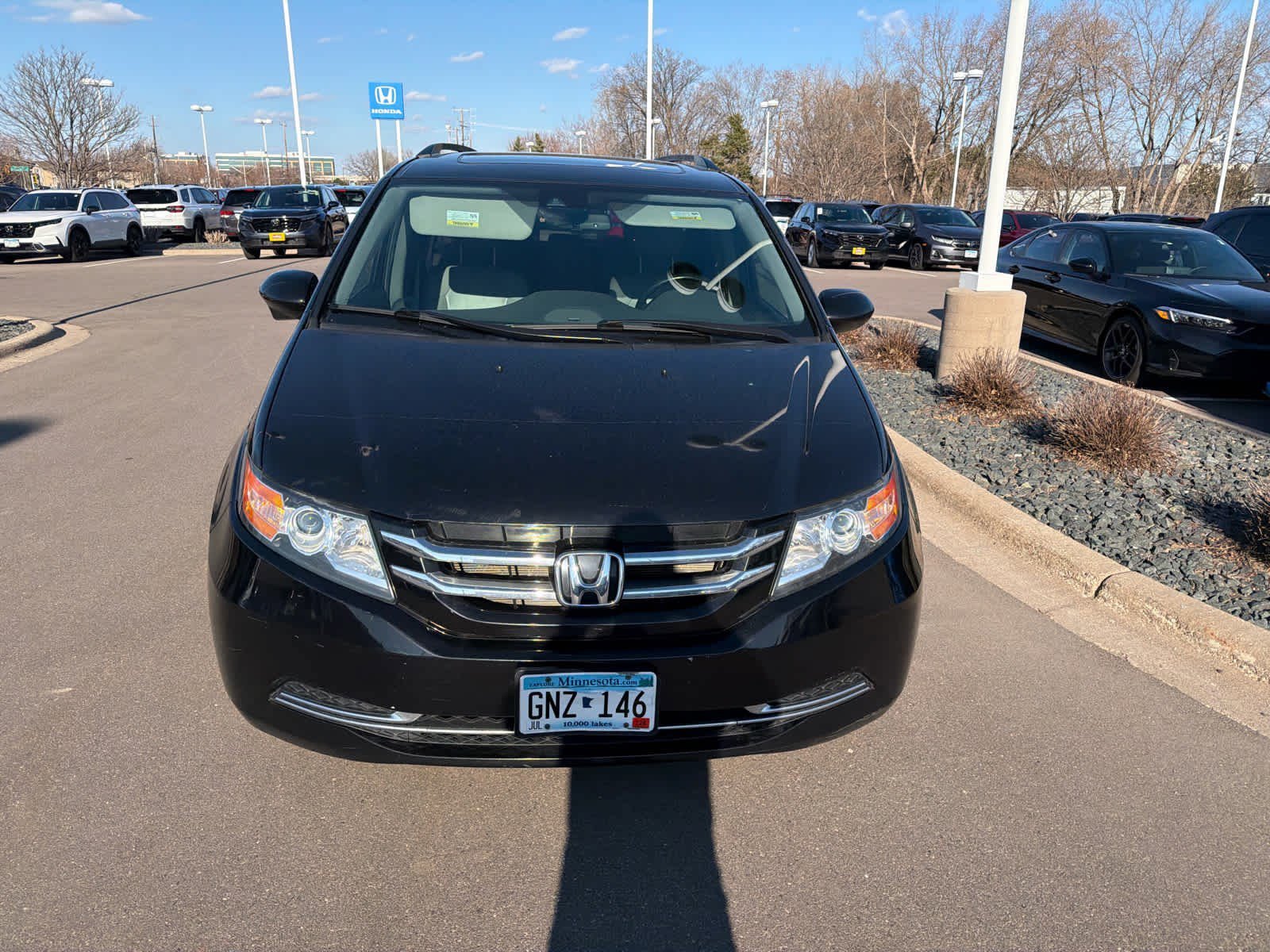 Used 2014 Honda Odyssey EX-L with VIN 5FNRL5H69EB063658 for sale in Hopkins, MN